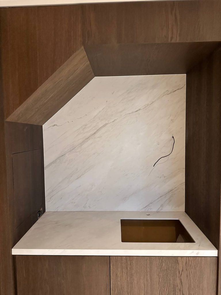 Custom porcelain slab sink and backsplash installation in Metro Vancouver